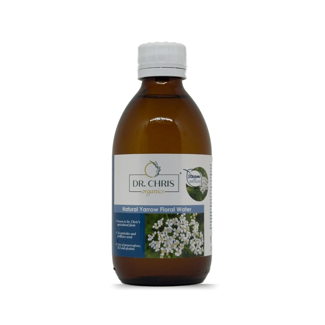 Product image of yarrow Floral Water by Dr. Chris Organics, 250 ml. A clear glass bottle with a minimalist label, featuring natural yarrow illustrations. The product is organic and designed for soothing and refreshing skincare.